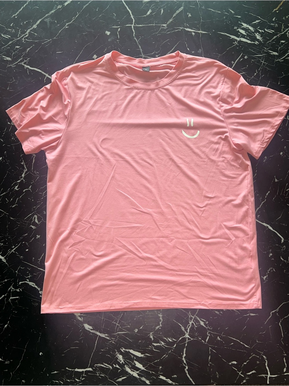 Men's Pink Short-Sleeve Crew Tee with Minimal Smile Graphic
